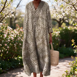 Lucy spring dress in a sunlit garden