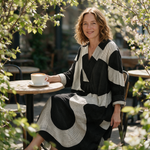Melinda spring dress three quarter view at an outdoor cafe
