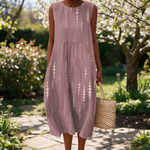 Georgie spring dress in a sunlit garden