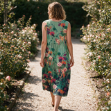 Gemma spring dress back view on a garden path