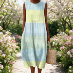Lisa spring dress in a sunlit garden
