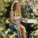 Jacinta spring dress three quarter view at an outdoor cafe
