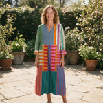 Hayley spring dress front view on garden terrace