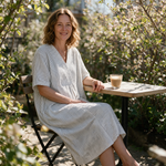 Robyn spring dress three quarter view at an outdoor cafe