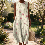 Zoe spring dress in a sunlit garden