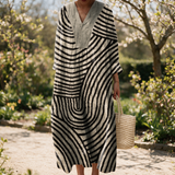 Sienna spring dress in a sunlit garden