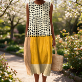 Simone spring dress in a sunlit garden